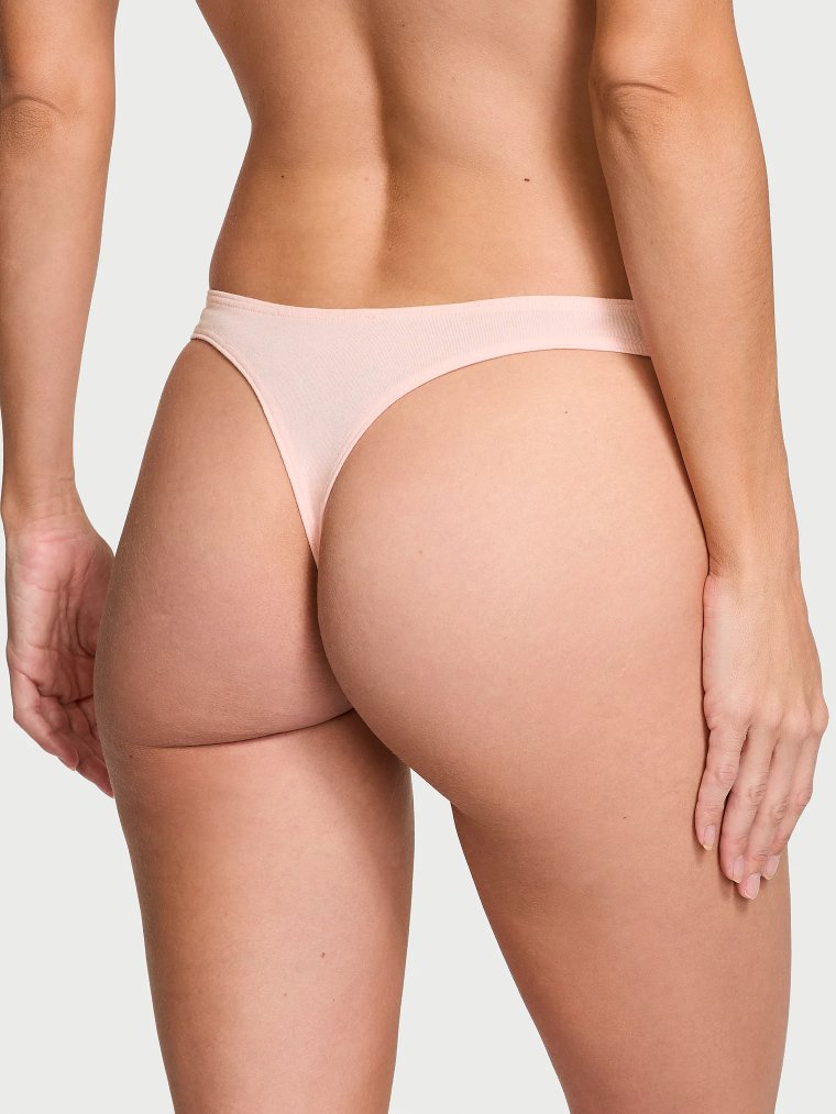 Стринг (thong) из стрейч-хлопка с высокой линией бедра и вырезом